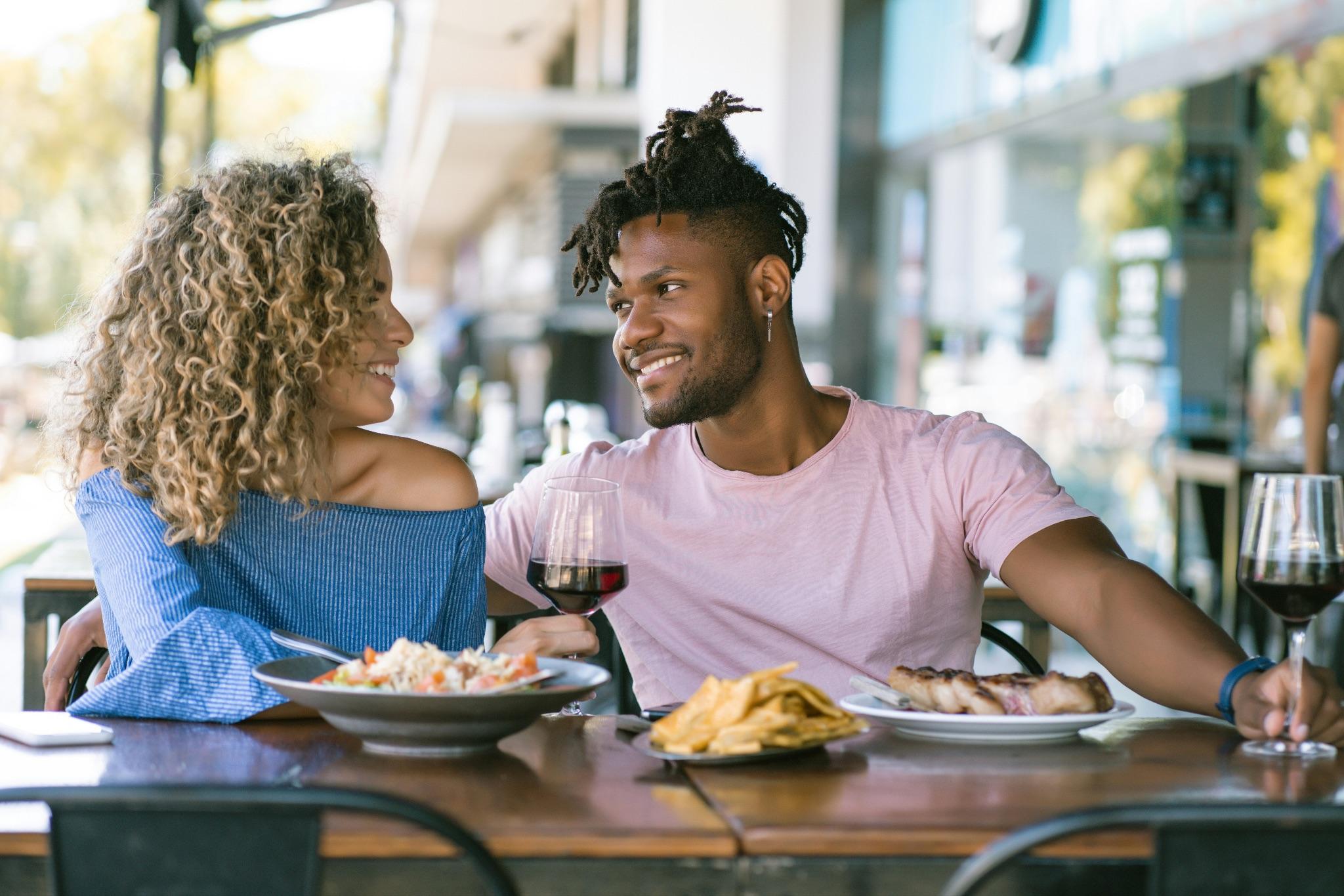 Couple dining outdoors near Country Club Plaza